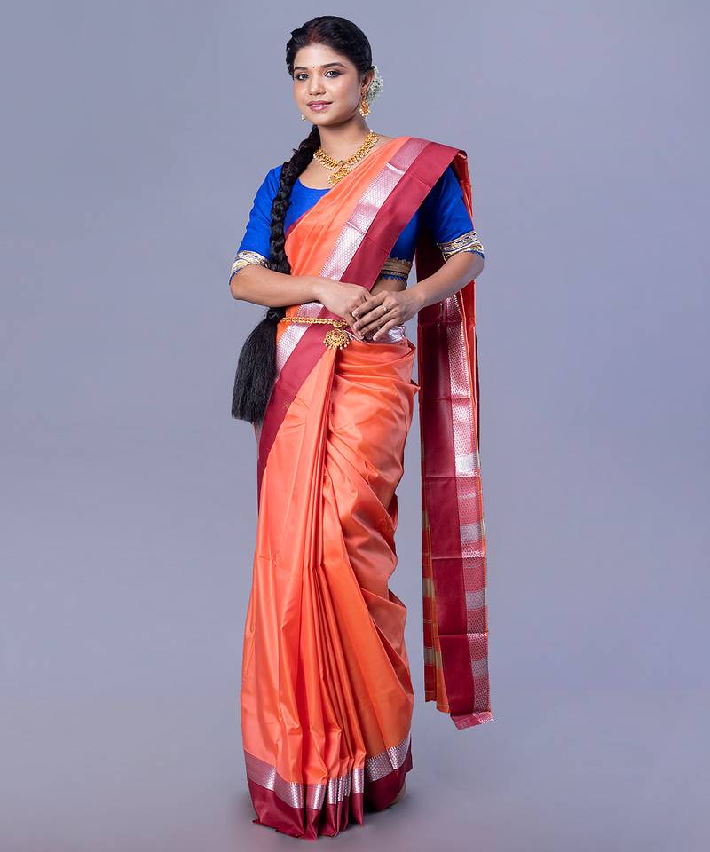 Kanjivaram silk saree in rust color with maroon and silver border