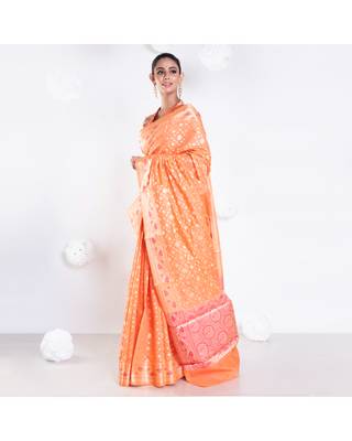 Banarasi kora organza saree in orange color with golden booti and border 3