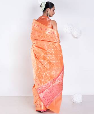Banarasi kora organza saree in orange color with golden booti and border 4
