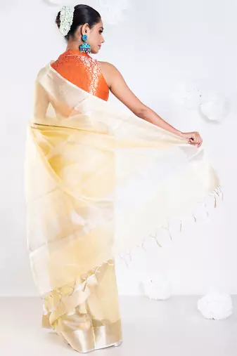 Banarasi chanderi saree in vintage yellow color with zari border