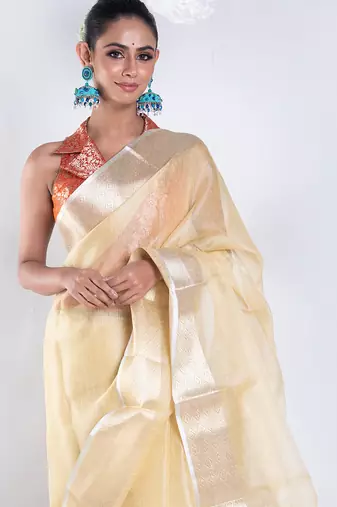 Banarasi chanderi saree in vintage yellow color with zari border