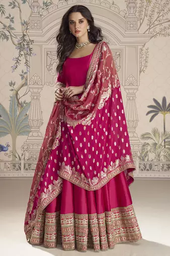 Rani pink viscos jacquard silk embroidered gown with viscos dupatta