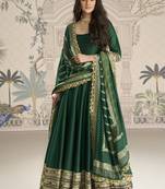 Green viscos jacquard silk embroidered gown with viscos dupatta