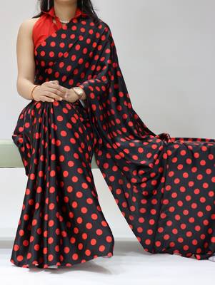 black color polka dots print heavy japan satin saree with unstitched blouse 1