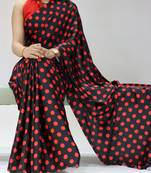 black color polka dots print heavy japan satin saree with unstitched blouse