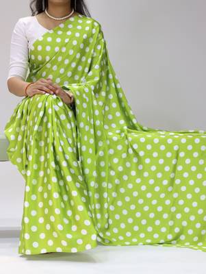 green color polka dots print heavy japan satin saree with unstitched blouse 1
