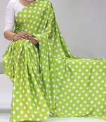 green color polka dots print heavy japan satin saree with unstitched blouse
