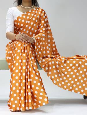 orange color polka dots print heavy japan satin saree with unstitched blouse 1