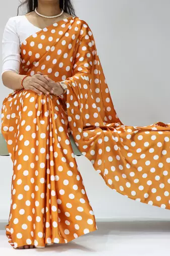 orange color polka dots print heavy japan satin saree with unstitched blouse