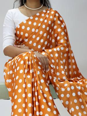 orange color polka dots print heavy japan satin saree with unstitched blouse 2