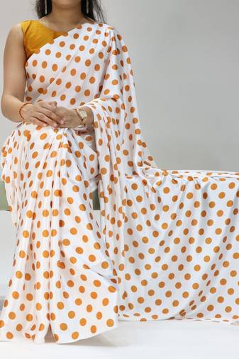 white color polka dots print heavy japan satin saree with unstitched blouse