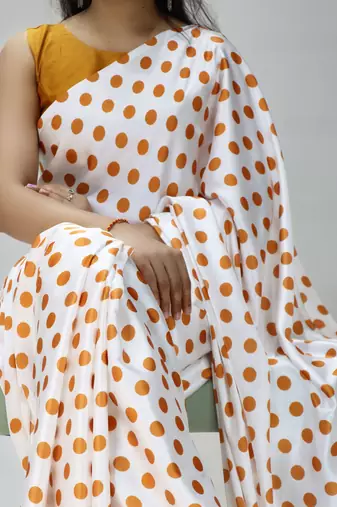 white color polka dots print heavy japan satin saree with unstitched blouse