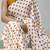 white color polka dots print heavy japan satin saree with unstitched blouse