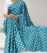rama color polka dots print heavy japan satin saree with unstitched blouse