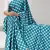 rama color polka dots print heavy japan satin saree with unstitched blouse