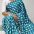 rama color polka dots print heavy japan satin saree with unstitched blouse