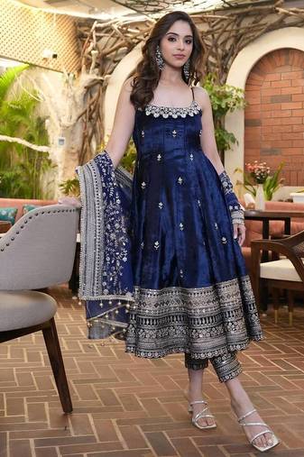 Blue color vichitra silk heavy embroidered gown with sequins zari work, micro cotton pant and lace work dupatta set