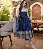 Blue color vichitra silk heavy embroidered gown with sequins zari work, micro cotton pant and lace work dupatta set