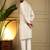 Ivory viscose silk elephant embroidered kurta pyjama set for men     festive & wedding wear