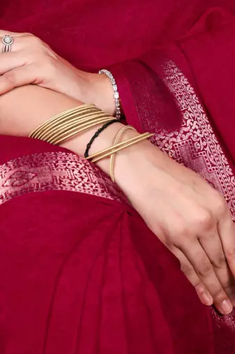 traditional indian poly shimmer saree, detailed zari weaving border 