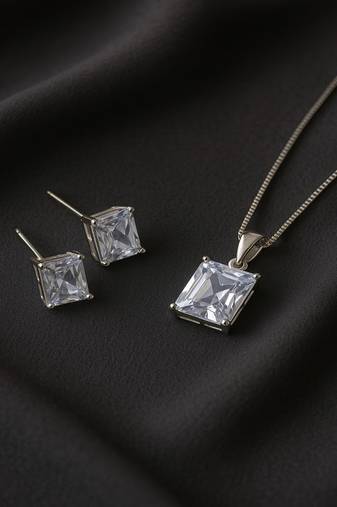 Jewelz silver-tone solitaire pendant necklace set with matching studs
