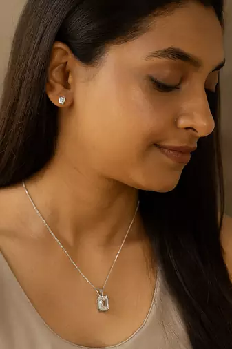 Jewelz silver-tone solitaire pendant necklace set with matching studs