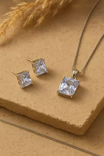 Jewelz silver-tone solitaire pendant necklace set with matching studs