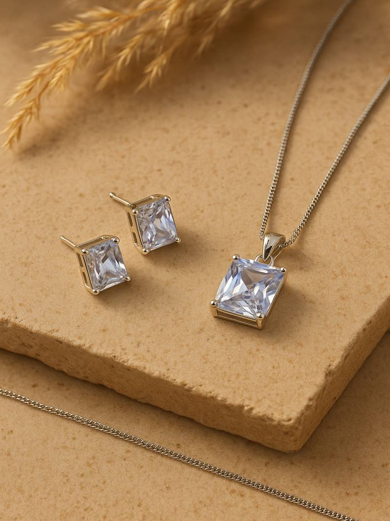 Jewelz silver-tone solitaire pendant necklace set with matching studs