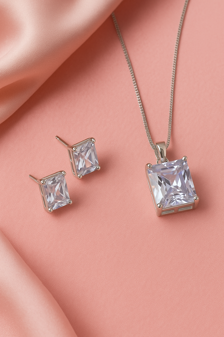 Jewelz silver-tone solitaire pendant necklace set with matching studs