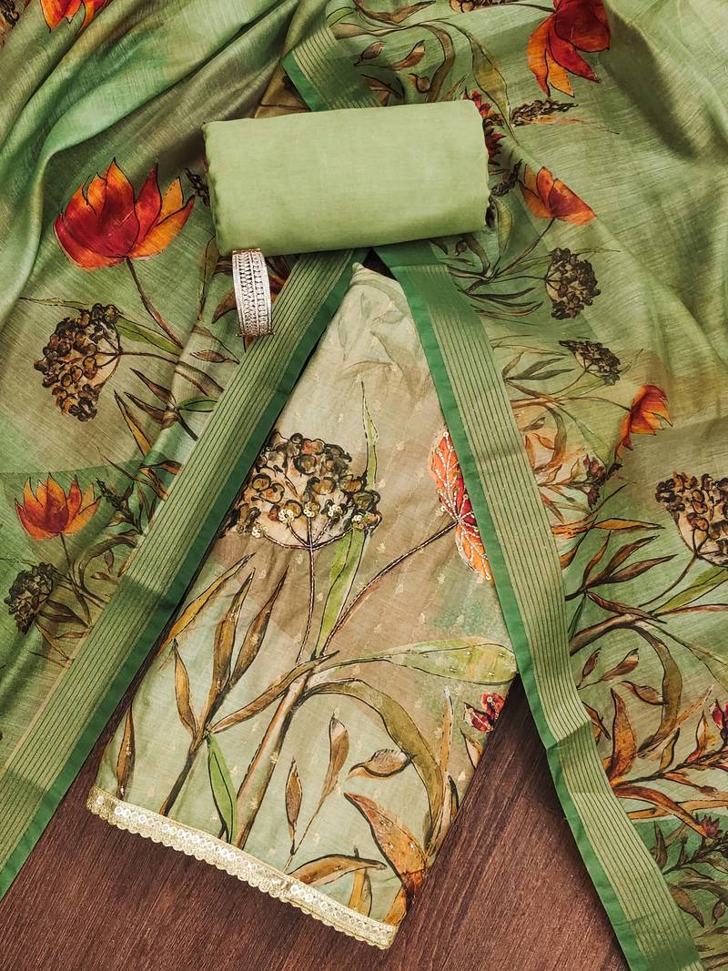 Green hand embroidery cotton semi stitched churidar dress-materials