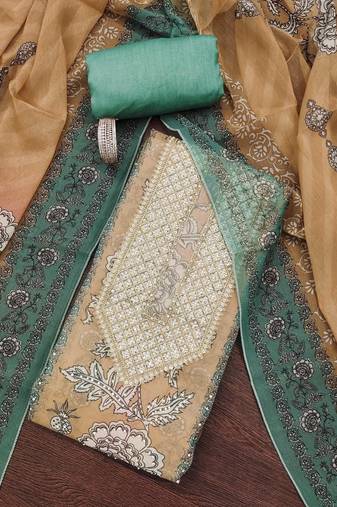 Green hand embroidery shimmer semi stitched churidar dress-materials