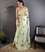 light green organza silk blend handloom banarasi saree with heavy khatali butta work