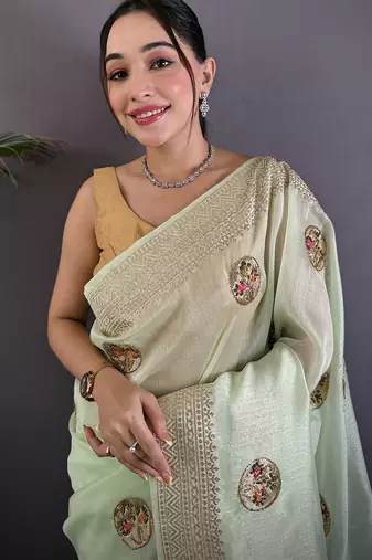 light green organza silk blend handloom banarasi saree with heavy khatali butta work