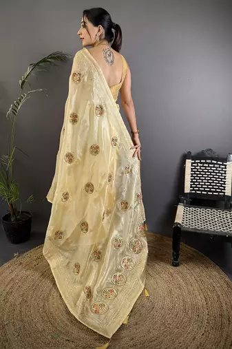 light yellow organza silk blend handloom banarasi saree with heavy khatali butta work