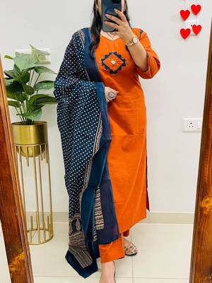 Floral embroidered orange v neck cotton kurta set with trouser & dupatta 1