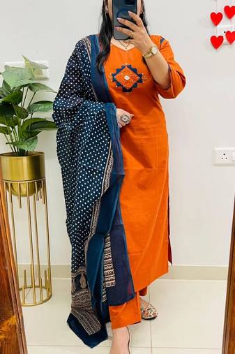 Floral embroidered orange v neck cotton kurta set with trouser & dupatta