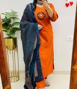 Floral embroidered orange v neck cotton kurta set with trouser & dupatta
