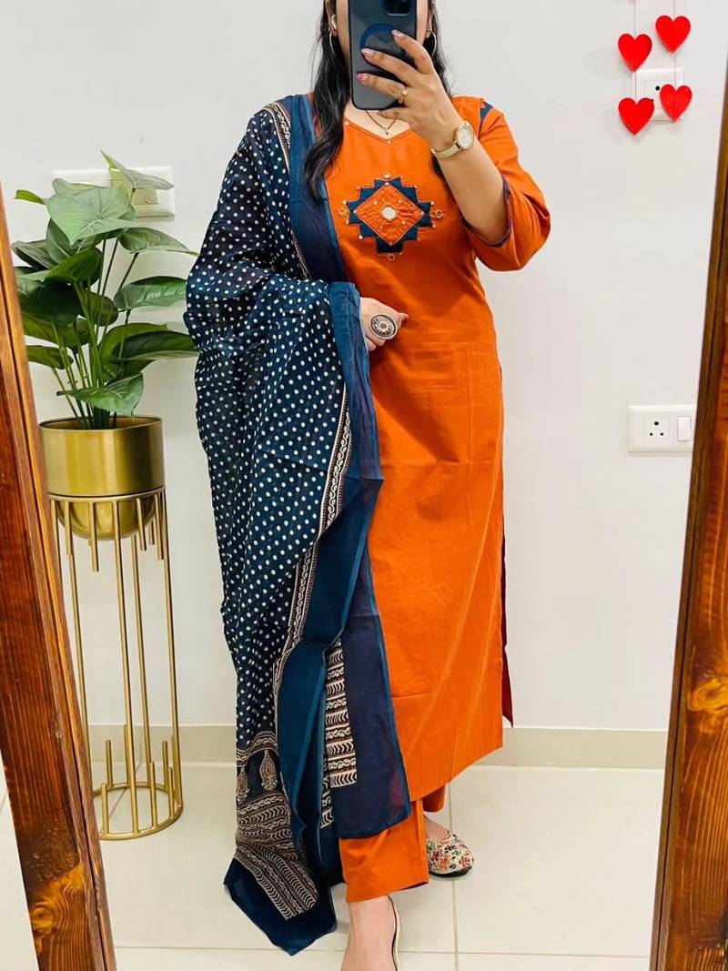 Floral embroidered orange v neck cotton kurta set with trouser & dupatta