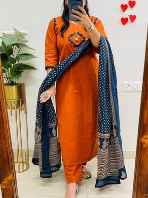 Floral embroidered orange v neck cotton kurta set with trouser & dupatta 2