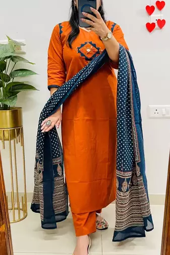 Floral embroidered orange v neck cotton kurta set with trouser & dupatta