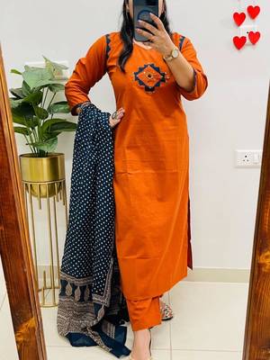 Floral embroidered orange v neck cotton kurta set with trouser & dupatta 3