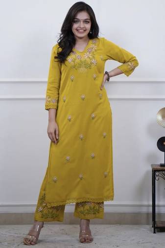 Floral embroidered yellow v neck cotton kurta set with trouser