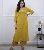 Floral embroidered yellow v neck cotton kurta set with trouser