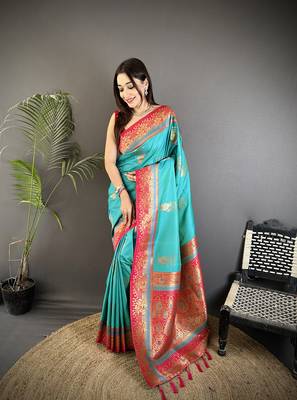 aqua green soft silk blend dual zari peacock butta worked banarasi saree  1