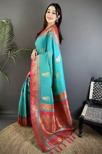 aqua green soft silk blend dual zari peacock butta worked banarasi saree 