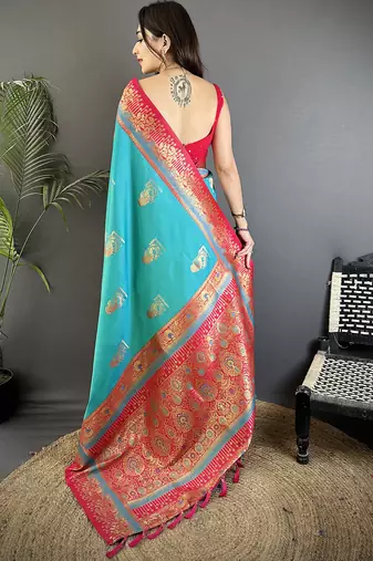 aqua green soft silk blend dual zari peacock butta worked banarasi saree 