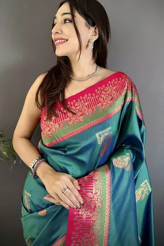 teal soft silk blend dual zari peacock butta worked banarasi saree 