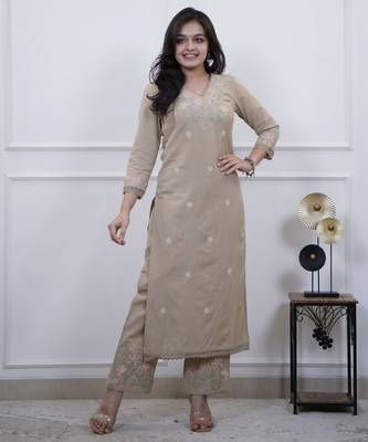 Floral embroidered beige v neck cotton kurta set with trouser 1