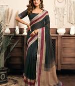 Black linen one-minute saree with contrast stripes border, lightweight drape & pocket feature