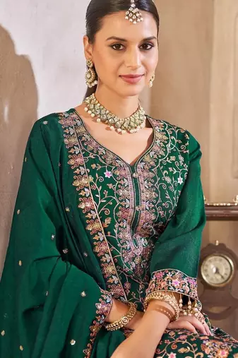 Green vichitra silk readymade suit with embroidered lace 